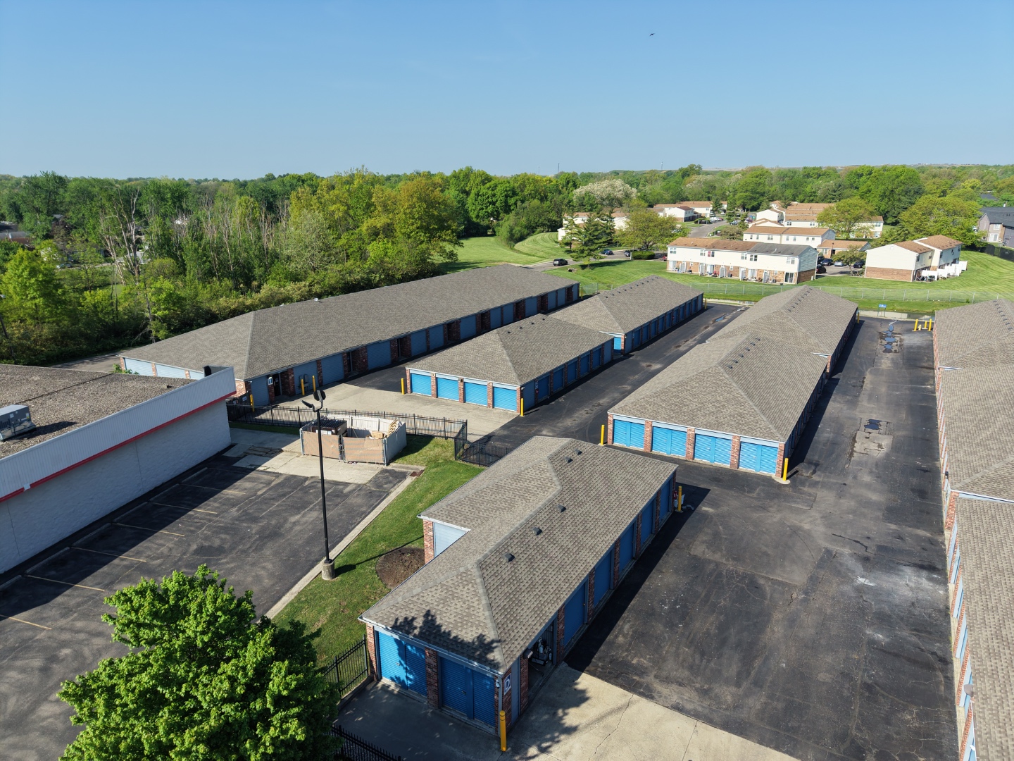 Completed commercial roof — new shingles and clean ridgeline