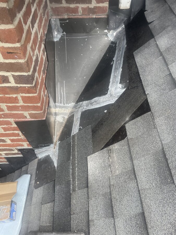 Step flashing wall junction