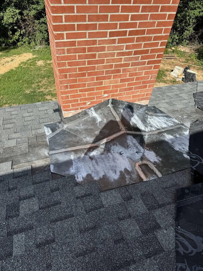 Step flashing chimney corner